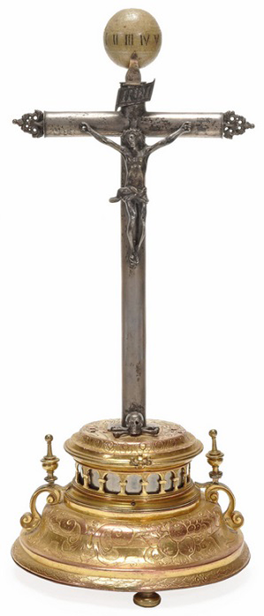 German gilt copper and brass crucifix clock is attributed to Hans Schlottheim. Estimate: £800-£1,200 ($1,335-$2,000). Dreweatts & Bloomsbury image.