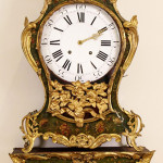 Lovely French gilt bronze bracket clock with hand-painted floral and antlered stag decoration. Ahlers & Ogletree image.