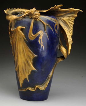 Amphora ceramic dragon vase, 14 inches tall, blue with gold glazes, mint condition, est. $12,000-$15,000. Morphy Auctions image.