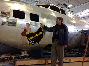 Volunteer and artist Frank Drain designed and painted the artwork on the nose. Champaigne Aviation Museum image. Photo4-1.jpg