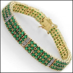 22.19 carat emerald and diamond 18K gold bracelet designed by Dana Y. Est. $1,800-$2,250. U.S. Auction Gallery image.
