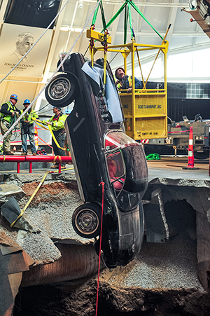 A 1962 Corvette was lifted out of the sinkhole nose first on Tuesday. Image courtesy of Chevrolet.