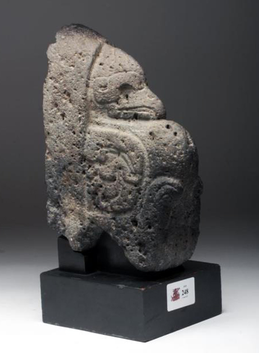 Lot 101F: Mayan stone palma, ex-Ron Messick, circa A.D. 550-950. Estimate $3,500-$4,500. Artemis Gallery LIVE image.
