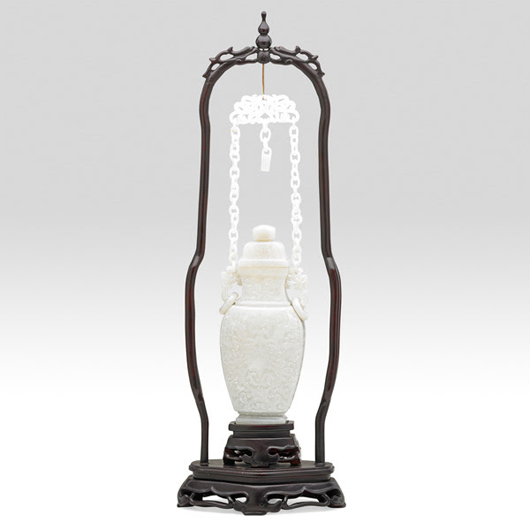 Lot 428: Chinese carved white jade hanging covered vase, $12,000-$18,000. Rago Arts and Auction Center image.