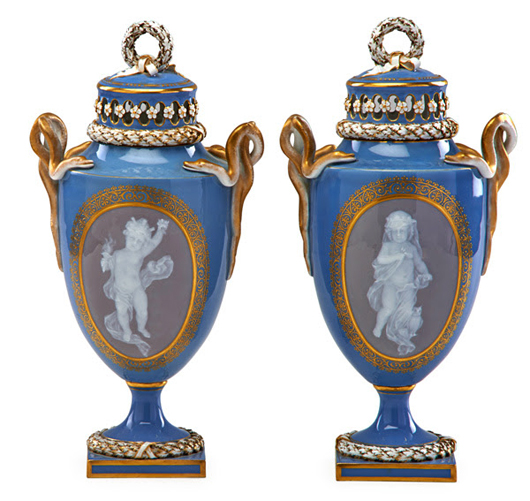 Lot 90: pair of Meissen pate sur pate covered urns, $4,000-$6,000. Rago Arts and Auction Center image.