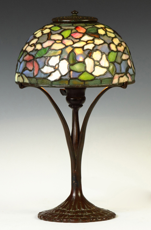 Lot 246 – Tiffany Studios Dogwood table lamp, 18 inches high, shade diameter 10 inches. Estimate: $20,000-$30,000. Cottone Auctions image.