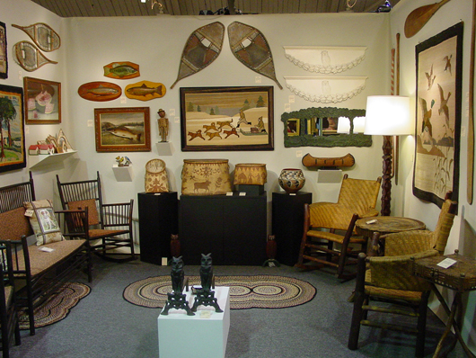 At a past NHADA show, Cherry Gallery showed rustic antiques, always a favorite with buyers at the annual summer event. Photo copyright Catherine Saunders-Watson.