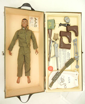 G.I. Joe figure in G.I.-type foot locker, with accessories, including boots, guns, dog tags and canteen. Image courtesy of LiveAuctioneers.com and Stephenson's Auctions.