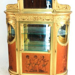 Lot 136 – fine American Aesthetic Movement gilded cabinet, attributed to Herter Brothers, New York City. Wooten & Wooten Auctioneers image.