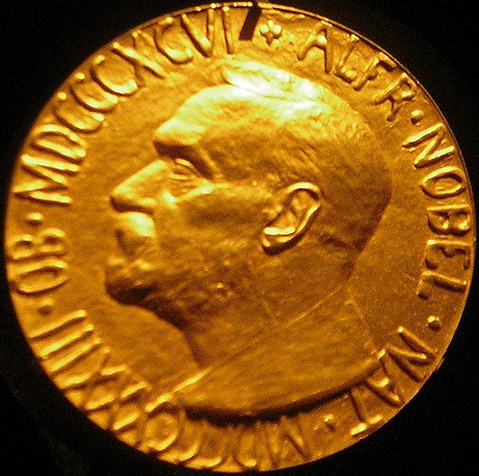 The obverse of a gold 1933 Nobel Peace Prize. This work is licensed under the Creative Commons Attribution-ShareAlike 3.0 License.