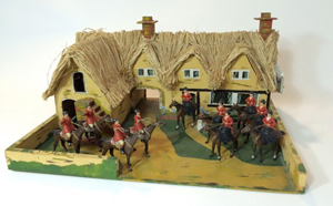 Lot 2512 - Heyde Hunt figures, 60mm, with Huntsman Cottage, est. $600-$800. Old Toy Soldier Auctions image