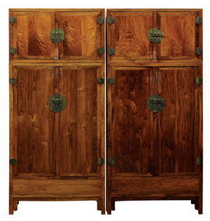 Coming from the Gerber estate, this pair of Chinese hardwood and huanghuali compound cabinets realized an astonishing $299,500. Clars Auction Gallery image.