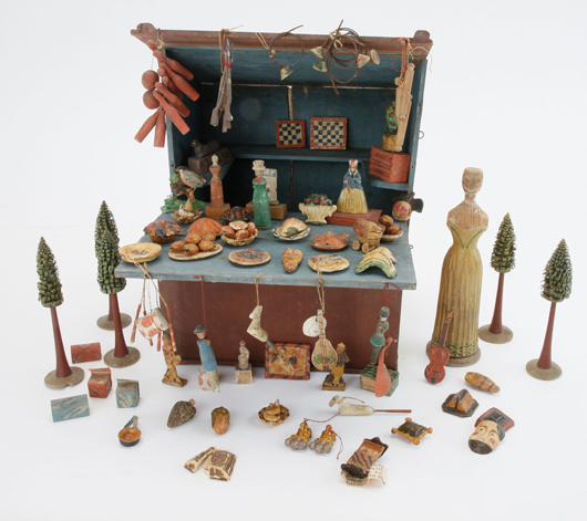 German Toy Stall, formerly in the Washington Dolls’ House & Toy Museum, German, early 19th century, elaborately accessorized with antique miniatures (accessories to be auctioned separately). Est. $6,000-$9,000. Noel Barrett Auctions image.