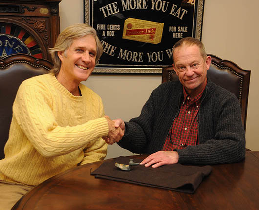 Left to right: Edson Bourn, consignor of the Parks Birdstone; and John Mark Clark, head of Morphy Auctions’ Prehistoric American Artifacts division; seal the deal to add the Parks Birdstone to Morphy’s May 17, 2014 auction. Morphy Auctions image.