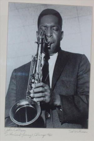 Photograph of John Coltrane performing at the Sutherland Lounge, Chicago, 1960 signed. Image courtesy of LiveAuctioneers.com Archive and Harrison Auctions.