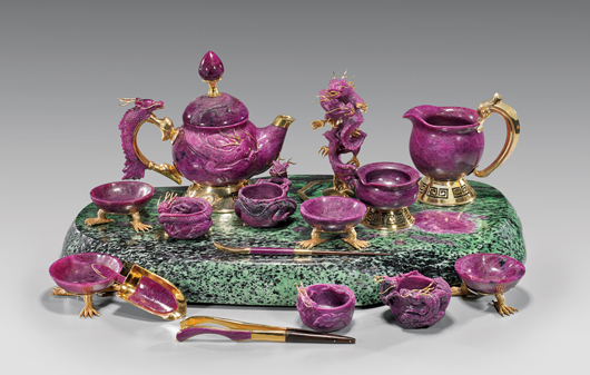 Exquisite 16-piece carved ruby matrix dragon tea set with gilt mountings and accents, $219,600. I.M. Chait image