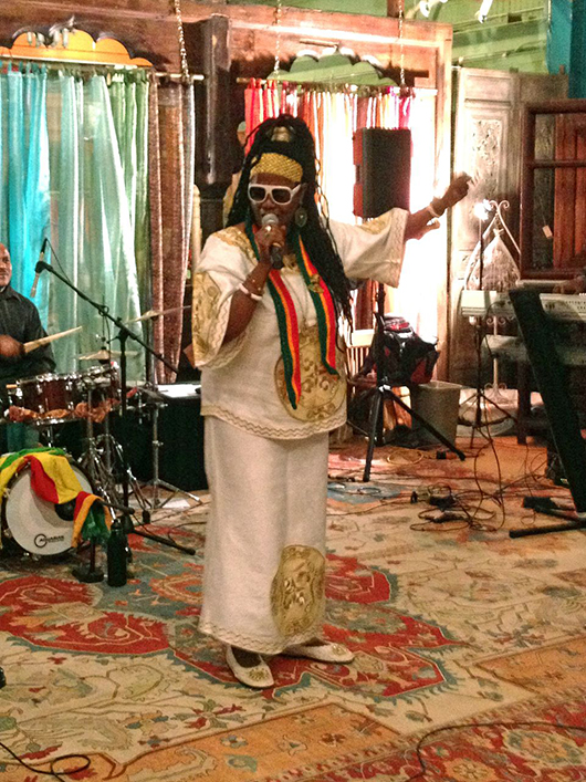 Sister Carol belts out a crowd-pleasing reggae tune. Material Culture image