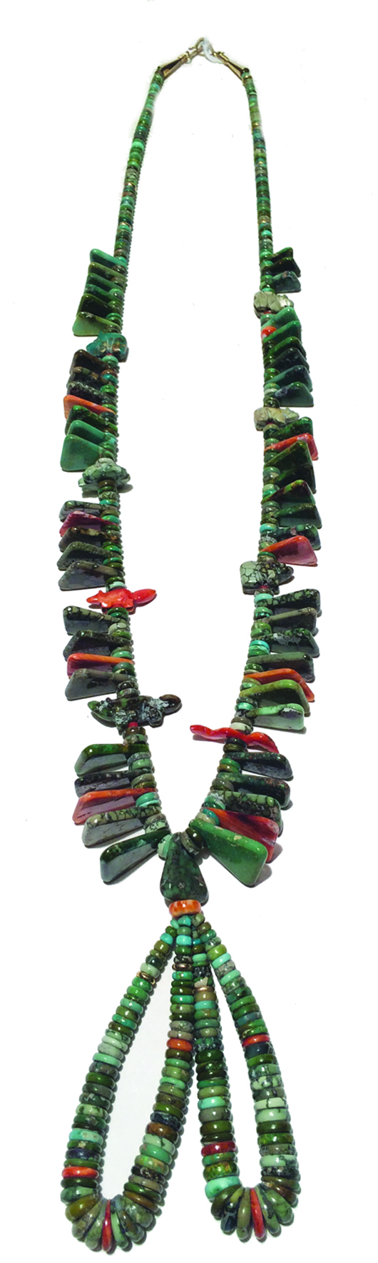 Graduated green turquoise heshi strand fetish necklace with figures, made circa 1960s. Price realized: $2,875. Allard Auctions Inc. image.