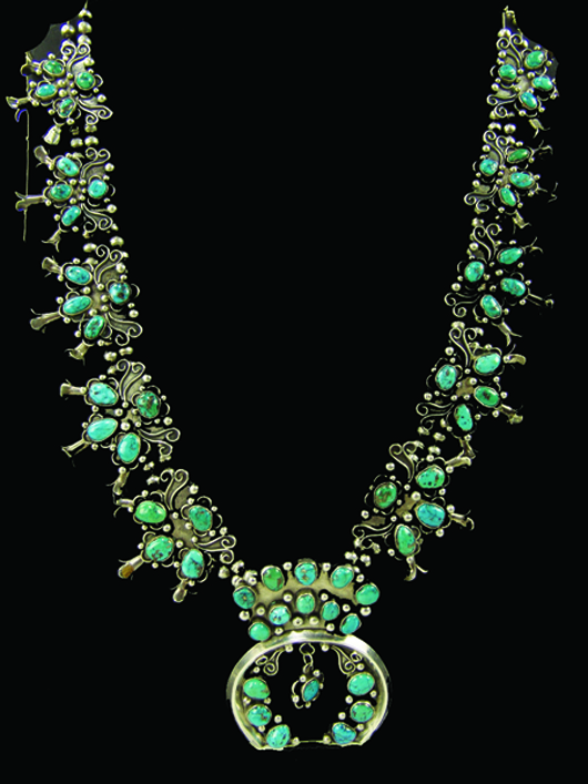 Oversized turquoise and silver squash blossom Navajo necklace by Yellow Bird. Price realized: $3,163. Allard Auctions Inc. image.