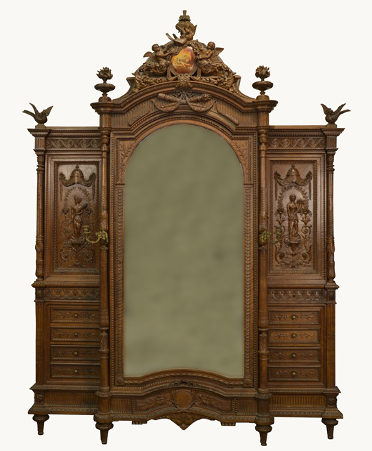 Impressive Louis XVI-style finely carved walnut dome-top armoire with bronze candelabra, 114 x 82 inches. Est. $10,000-$20,000. Grogan & Co. image  