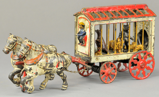 Circa-1890 Kyser & Rex circus cage wagon with articulated action, 13in long, est. $4,000-$5,000. Bertoia Auctions image