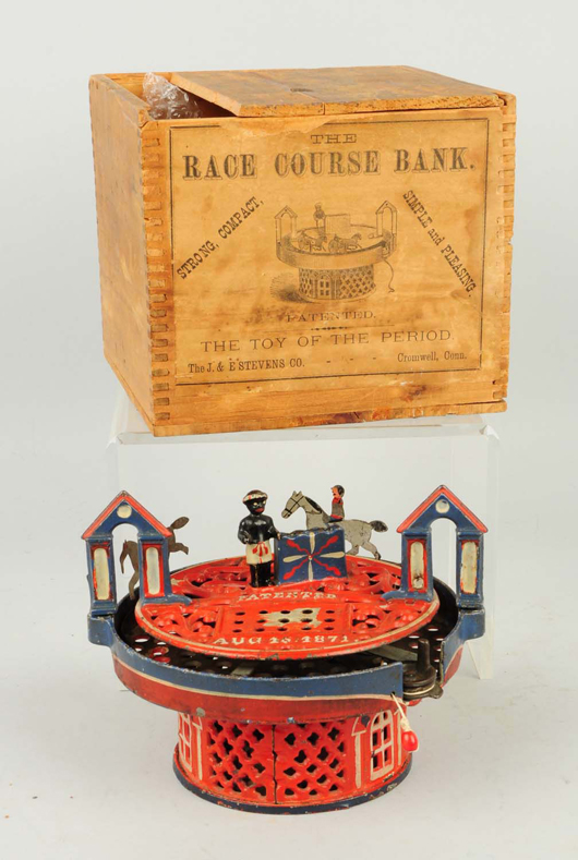 J. & E. Stevens Horse Race mechanical bank with original box, 100% original condition, near mint. Est. $30,000-$50,000. Morphy Auctions image