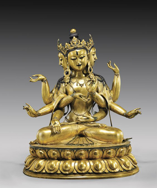 Massive Sino-Tibetan gilt bronze deity. I.M. Chait Gallery / Auctioneers image.