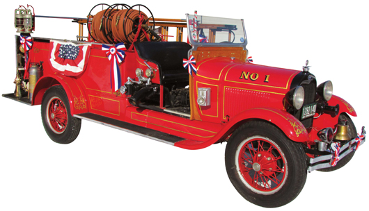 1928 red Ford Model A fire hose and ladder truck, with patriotic banners, ribbons. Price realized: $31,200. Showtime Auction Services image.