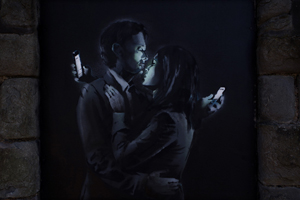 Banksy's 'Mobile Lovers.' Image courtesy of banksy.co.uk.