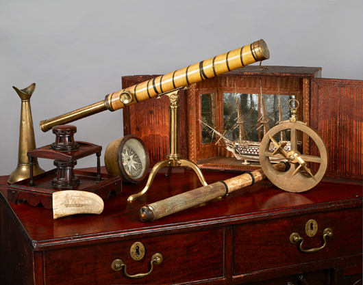 A selection of rarities including a 1595 mariners astrolabe, prisoner of war model and baleen-covered telescope. Charles Miller Ltd. image