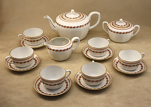 Giò Ponti, pottery china tea set: six cups, six small plates, teapot, sugar bowl, milk jug. Signed and golden scroll on each piece. Courtesy Nova Ars.