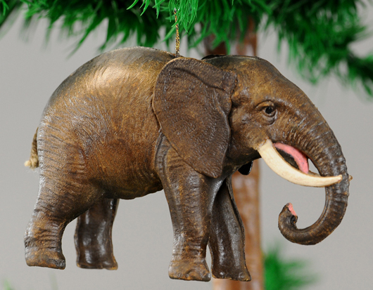 Dresden Christmas ornament of elephant with glass eyes and faux-ivory tusk, sold for $3,540. Bertoia Auctions image