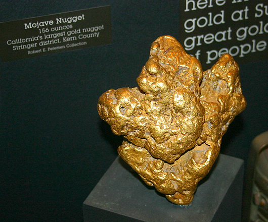 This 156-troy-ounce gold nugget, known as the Mojave Nugget, was found by a prospector in the Southern California Desert using a metal detector. Image by Chris Ralph, courtesy of Wikimedia Commons.