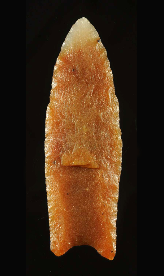 Translucent sugar quartz Clovis point, early Paleolithic, Fulton County, Illinois. Est. $45,000-$60,000. Morphy Auctions image
