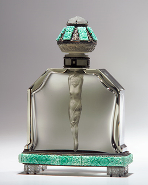 Hoffman 'nude dauber' perfume bottle in gray crystal. Elaborate mounting in silver metal, marcasites, and crystal jewels, the stopper crowned by crystal cameo Medusa, 1920s, 8 inches. Image courtesy of LiveAuctioneers.com Archive and Rago Arts and Auction Center.