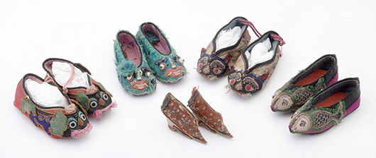 Four pairs of 19th century Chinese silk embroidered shoes shaped as fish, dragons, cats and Buddhist dogs, along with a pair of bound shoes. Estimate: £200-£300. Dreweatts & Bloomsbury Auctions image.  