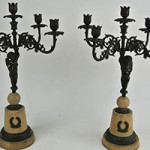 Pair of bronze candelabras, 21 1/2 inches high. Estimate: $400-$500. Don Presley Auction image.