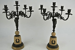 Pair of bronze candelabras, 21 1/2 inches high. Estimate: $400-$500. Don Presley Auction image.