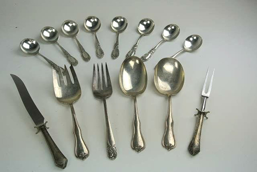 Fourteen pieces of sterling silverware. Estimate: $600-$700. Don Presley Auction image.