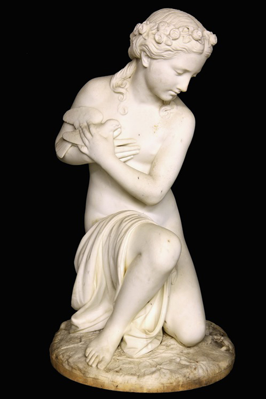 White marble sculpture by Pasquale Romanelli (Italy, 1812-1887) depicting the goddess Aphrodite with dove and snake. Estimate: $10,000-15,000. Thomaston Place Auction Galleries image.