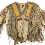 Northern Plains Indian Hidatsa buckskin shirt from the Dakotas with quill and seed bead decoration, fringe and buffalo hair tassels. Estimate: $20,000-30,000. Thomaston Place Auction Galleries image.
