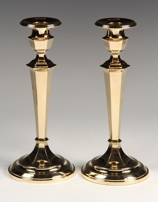 Pair of 14K yellow gold candlesticks by Gorham. Estimate: $7,000-10,000. Thomaston Place Auction Galleries image.