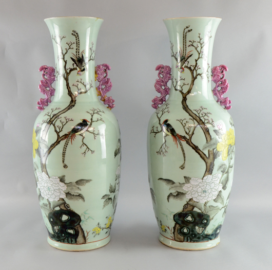 Pair of Chinese famille rose vases with dragon side handles, decorated with exotic birds amid flowering branches. Estimate: £1,500-£2,500. Ewbank's image.