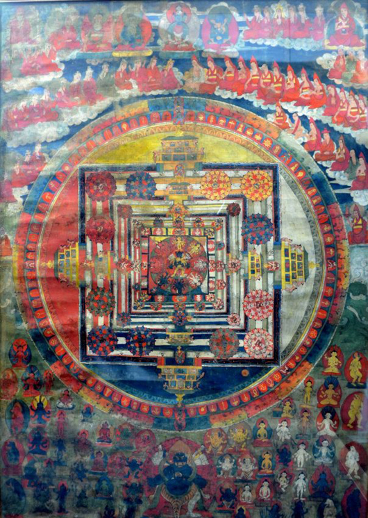 Tibetan mandala with a central tantric figure surrounded by bodisatvas, buddhist monks and tantric figures, 17th-18th century. Estimate: £2,500-£3,500. Ewbank's image.