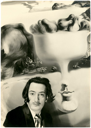 Photographer: W. Vennemann. Salvador Dali in front of his painting 'Apparition of Face and Fruit Dish on a Beach' (1938/39). Image courtesy of LiveAuctioneers.com Archive and Bassenge, Berlin.