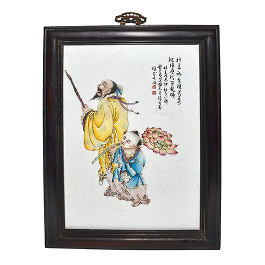 Lot  291, a 1928 Famille Rose porcelain plaque depiction the god of longevity and a young boy. It is inscribed with a poem and a long calligraphy inscription, the artist’s signature and two seals reading Tao an Zhai, the nearly 14-inch tall plaque  is expected to bring $6,000-$10,000. Gianguan Auctions image.