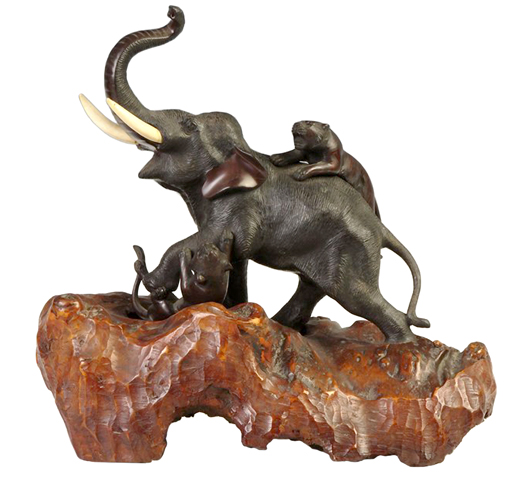 This signed Japanese bronze elephant sculpture with ivory tusks was made in about 1900 and sold in March 2014 at a Cottone Auctions in Geneseo, N.Y., for $920. If the suggested new antique ivory regulations become law, this antique bronze will be worthless because it will be illegal to sell it or even give it to a museum.