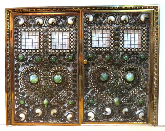 The top lot of the auction was this beautiful Moorish bronze jeweled fire screen attributed to Tiffany Studios. Price realized: $60,000. S & S Auction Inc. image.