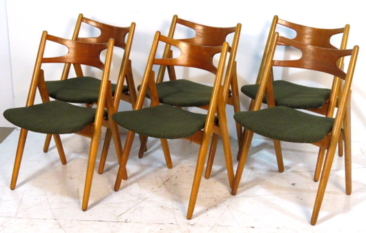 Set of six Hans Wegner teakwood sawbuck chairs in good condition, showing only light wear to the finish. Price realized: $3,000. S & S Auction Inc. image.