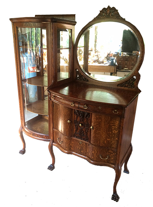 Rare oak curio server combination attributed to the renowned 19th century American furniture maker R.J. Horner. Tim’s Inc. Auctions image.